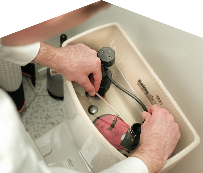 Haven Home plumbing specialist adjusts internal components of a toilet tank, with tile flooring visible in the background. Haven Home plumbing specialist adjusts internal components of a toilet tank, with tile flooring visible in the background.