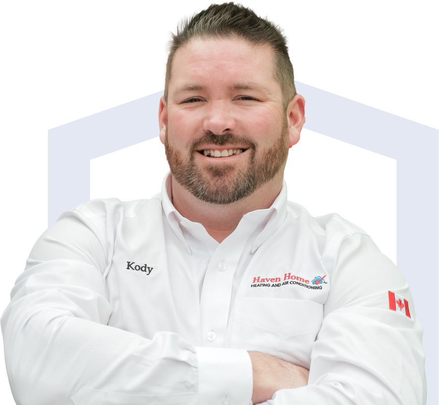 Haven Home team member in his white uniform, smiling broadly with teeth visible. Haven Home team member in his white uniform, smiling broadly with teeth visible.